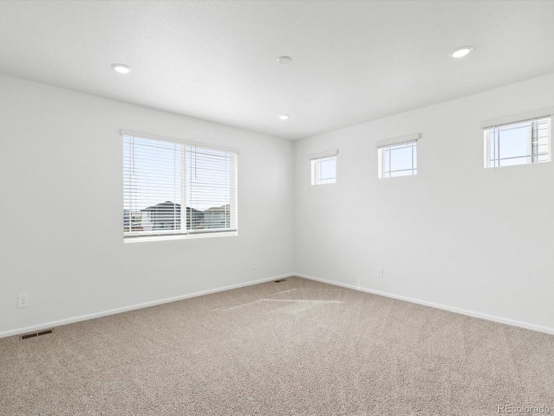 Spacious, unfurnished interior of a new home in Buffalo Highlands: The Canyon Collection, Commerce City (Image 18).