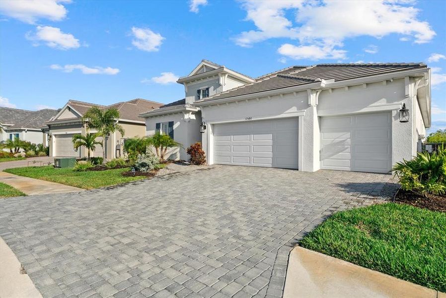 Front exterior of a new home in , Venice, FL, highlighting curb appeal (Image 2).