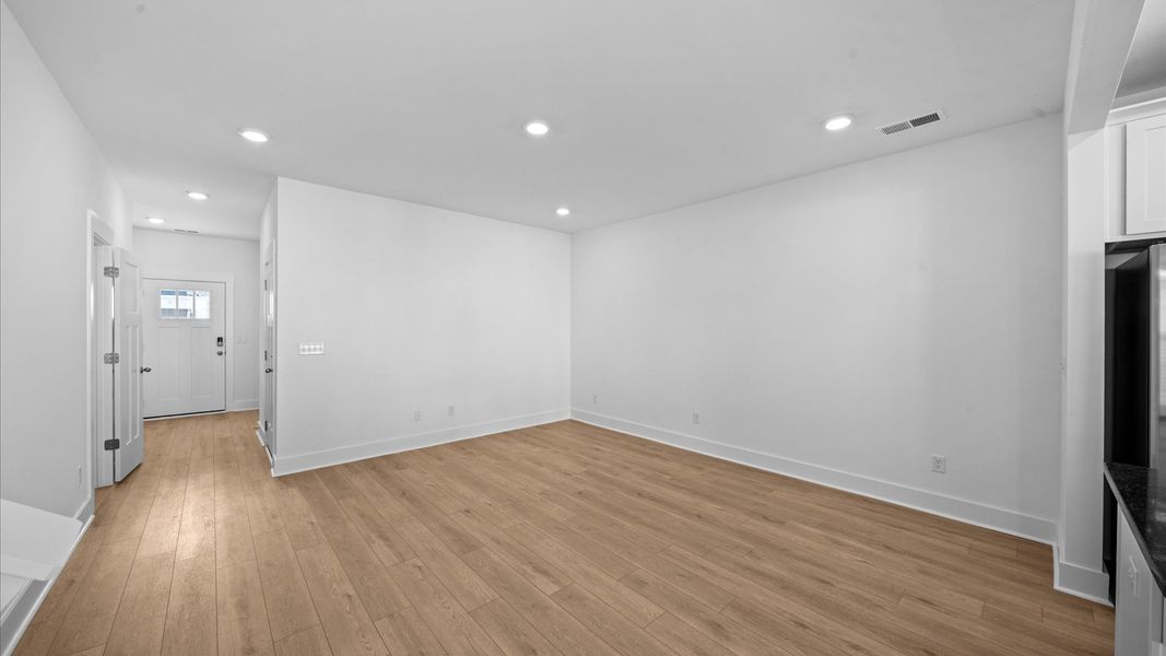 Exceptional family room featuring tasteful finishes and vibrant natural light near Downtown Greenville Exceptional family room featuring tasteful finishes and vibrant natural light near Downtown Greenville