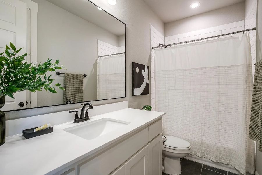 Representative furnished interior of a home built from the The Blaire by Elmwood Custom Homes in Matthews Farm, Venus (Image 28).