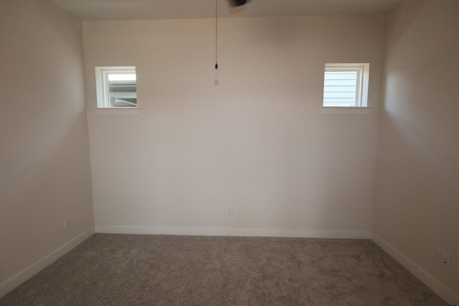 Spacious, unfurnished interior of a new home in Pomona - Grove Row Collection, Manvel (Image 4).