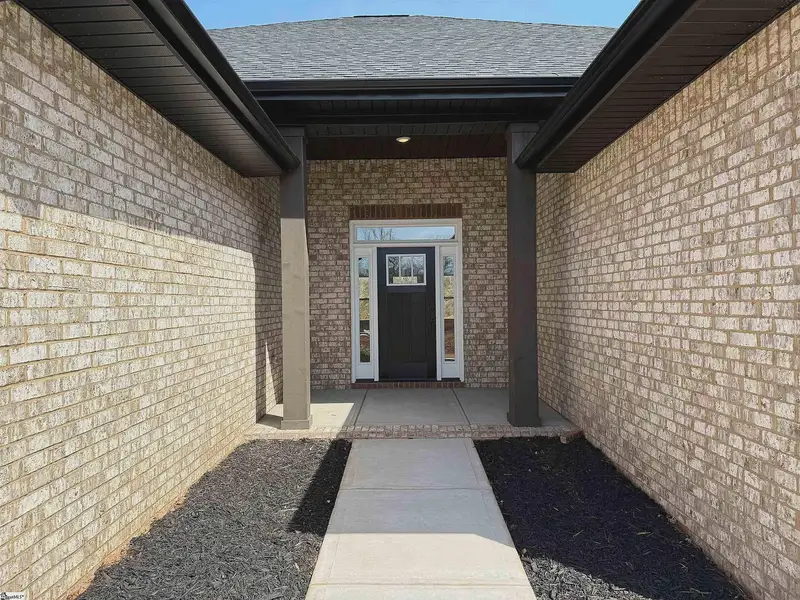 Exterior details and patio area of a home in Hidden Lake Estates, Greenville (Image 2). Exterior details and patio area of a home in Hidden Lake Estates, Greenville (Image 2).