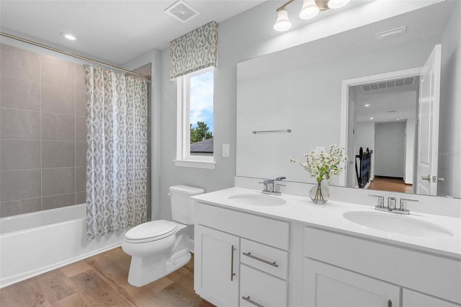 Furnished interior view inside a new home in Bella Terra, Clermont (Image 11).