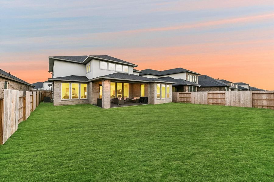 Exterior details and patio area of a home in Avalon at Friendswood, Friendswood (Image 29).