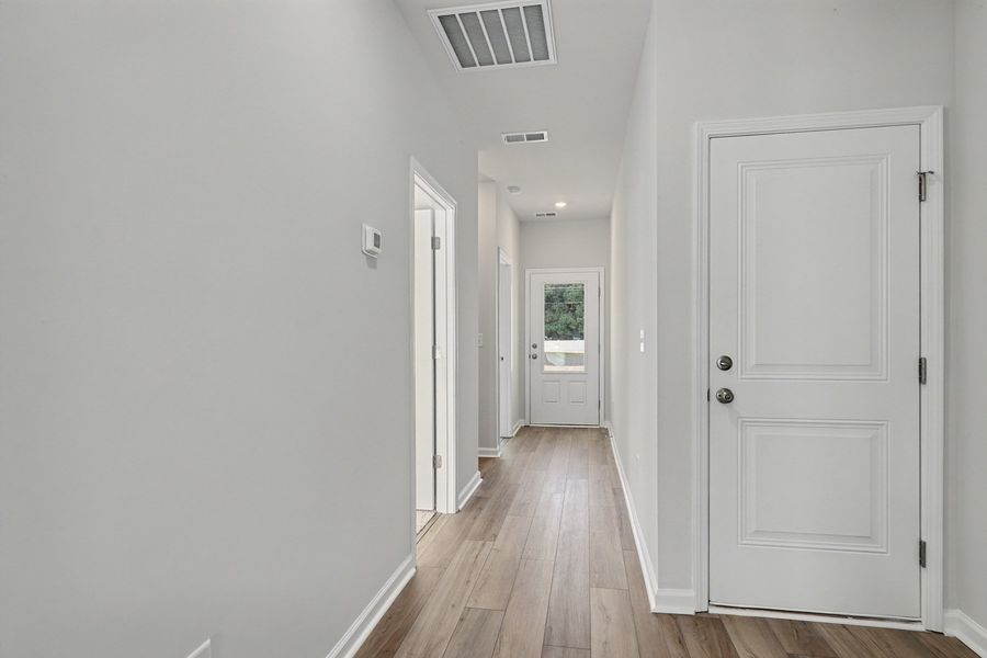 Spacious, unfurnished interior of a new home in Hainer Place, Conway (Image 27).