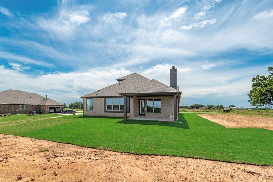 Exterior details and patio area of a home in , Whitesboro (Image 3).