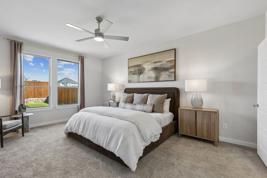 Primary Suite in a Sunset Ranch Winters Model Home in Gunter TX by Trophy Signature Homes