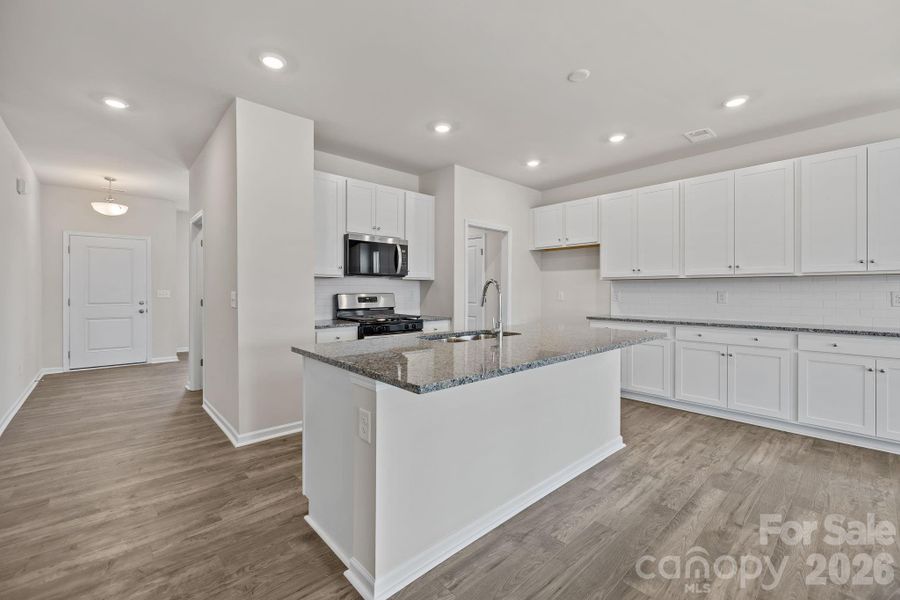 Furnished interior view inside a new home in McFarland Estates, York (Image 7).