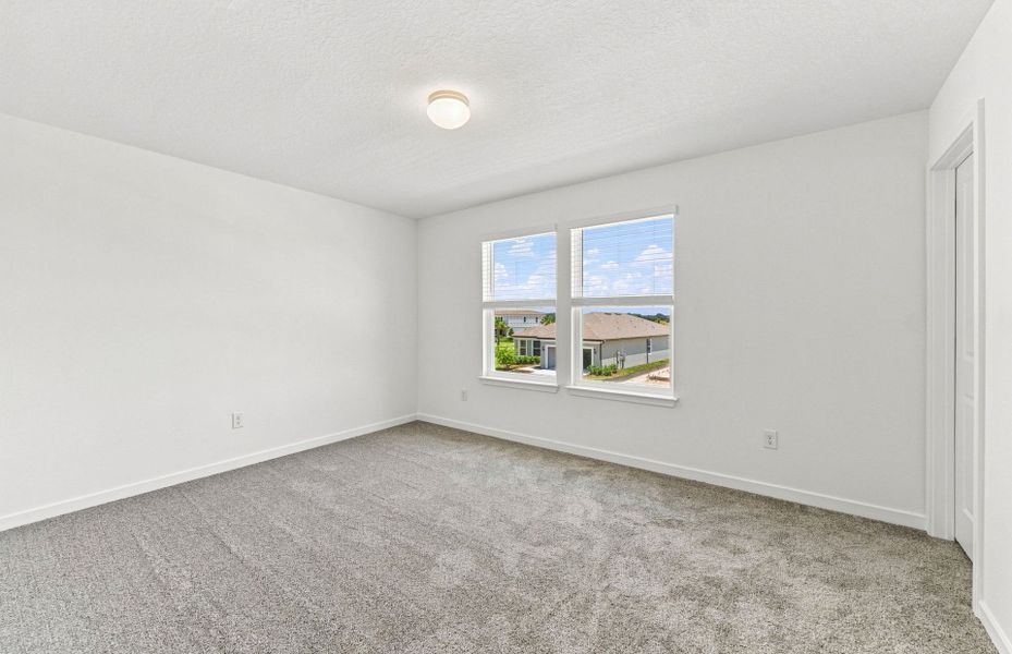 Spacious, unfurnished interior of a new home in Vida's Way, Wesley Chapel (Image 20).