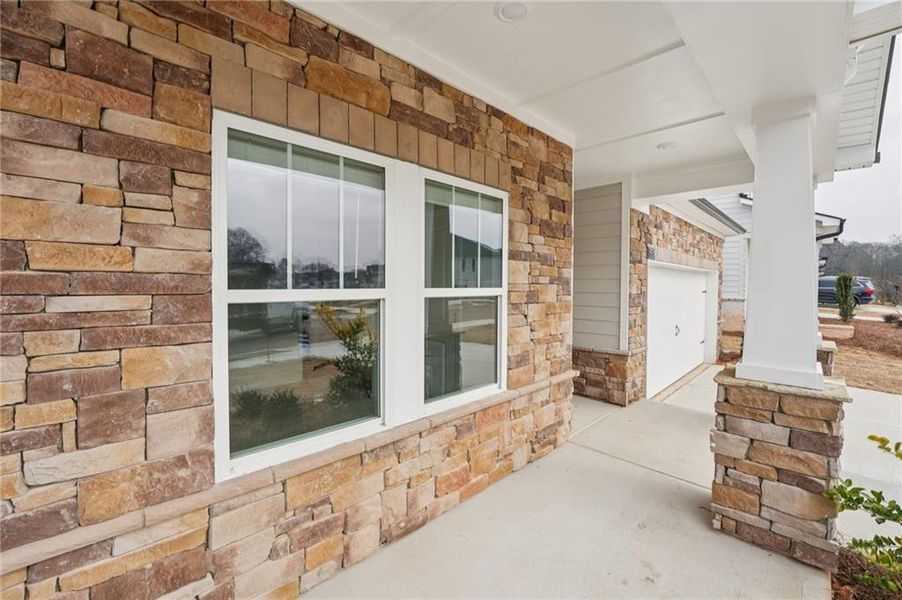 Exterior details and patio area of a home in Westmont Preserve, Powder Springs (Image 3).