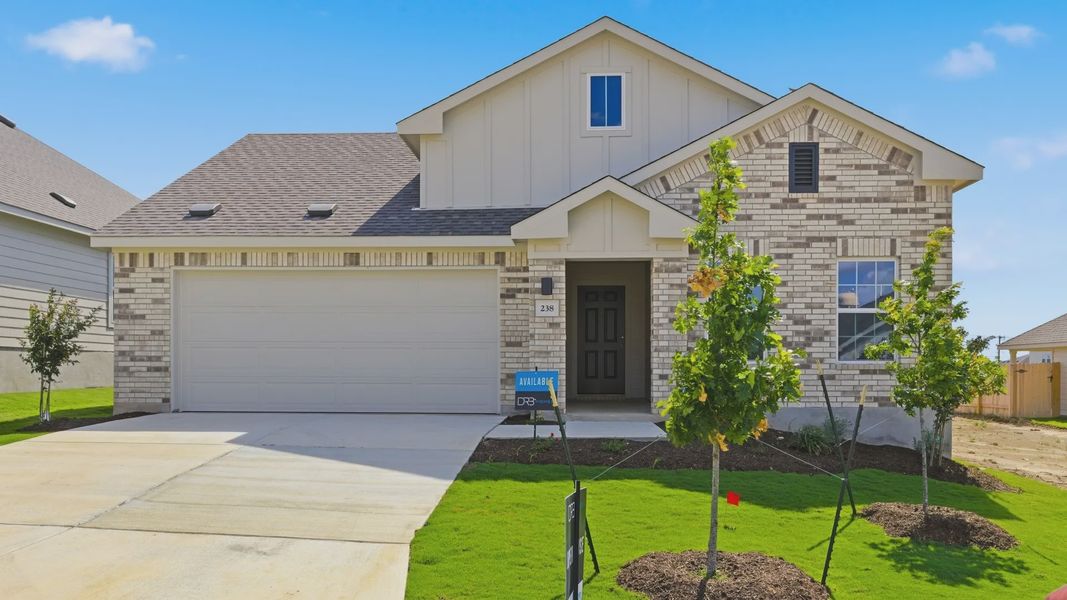 Front exterior of a new home in Calumet, Jarrell, TX, highlighting curb appeal (Image 1). Front exterior of a new home in Calumet, Jarrell, TX, highlighting curb appeal (Image 1).