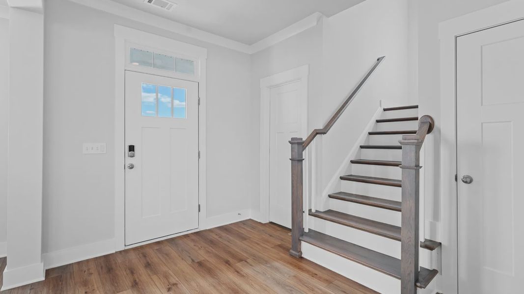 2 story single family home, all white with an open concept design