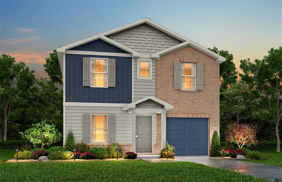 View of front of home with a yard and a garage