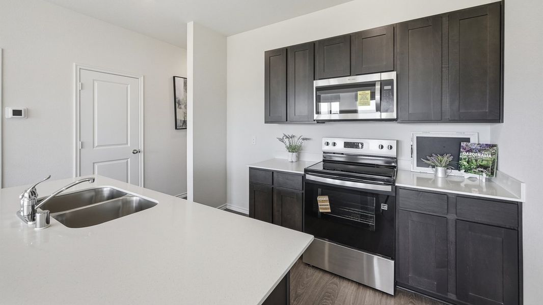 Representative furnished interior of a home built from the Argentina by D.R. Horton in Arbor Trails South, Princeton (Image 7).
