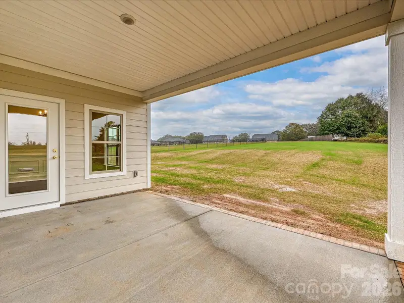 Exterior details and patio area of a home in , Monroe (Image 4).