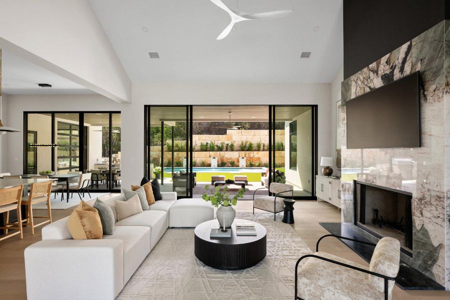 Volumetric perfection. Vaulted ceilings anchored by rich wood beam creates an atmosphere of airy, architectural grandeur