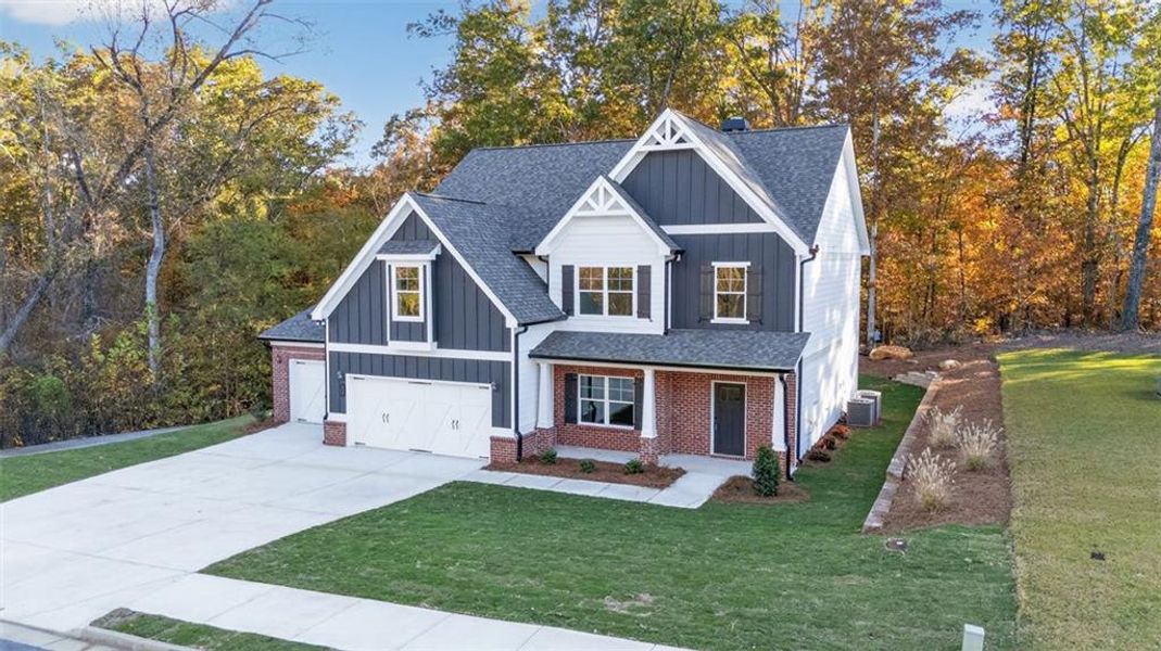 Front exterior of a new home in , Jefferson, GA, highlighting curb appeal (Image 25).