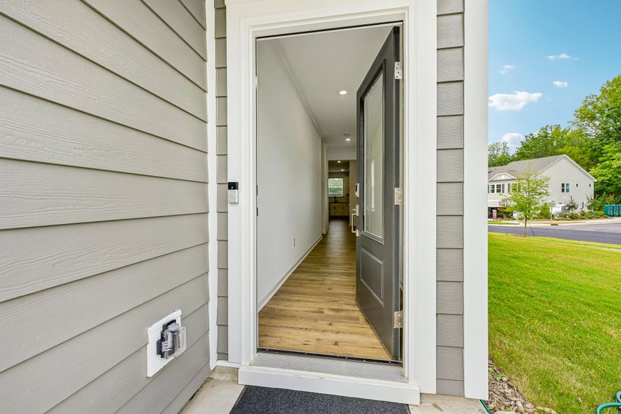 Exterior details and patio area of a home in Forestville Station, Wake Forest (Image 21).