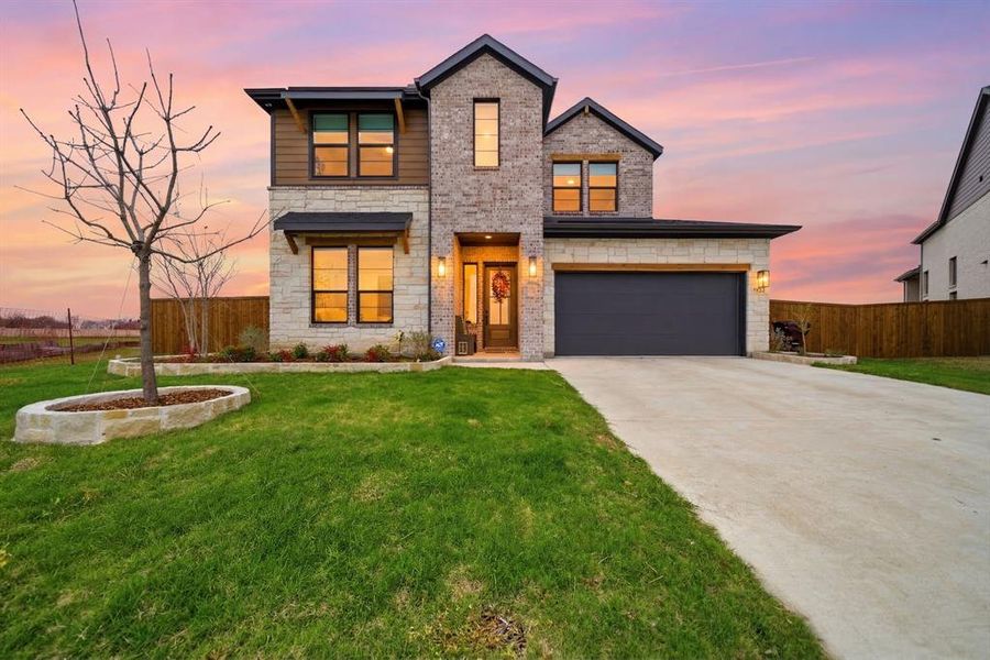 Front exterior of a new home in , Royse City, TX, highlighting curb appeal (Image 1). Front exterior of a new home in , Royse City, TX, highlighting curb appeal (Image 1).