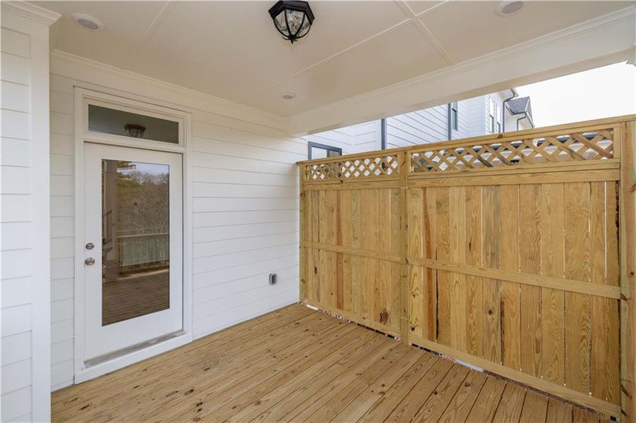 Exterior details and patio area of a home in Millcroft Townhomes, Buford (Image 24).
