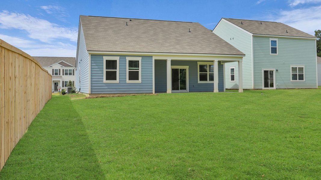 Front exterior of a new home in Lakeview at Kitfield, Moncks Corner, SC, highlighting curb appeal (Image 22). Front exterior of a new home in Lakeview at Kitfield, Moncks Corner, SC, highlighting curb appeal (Image 22).