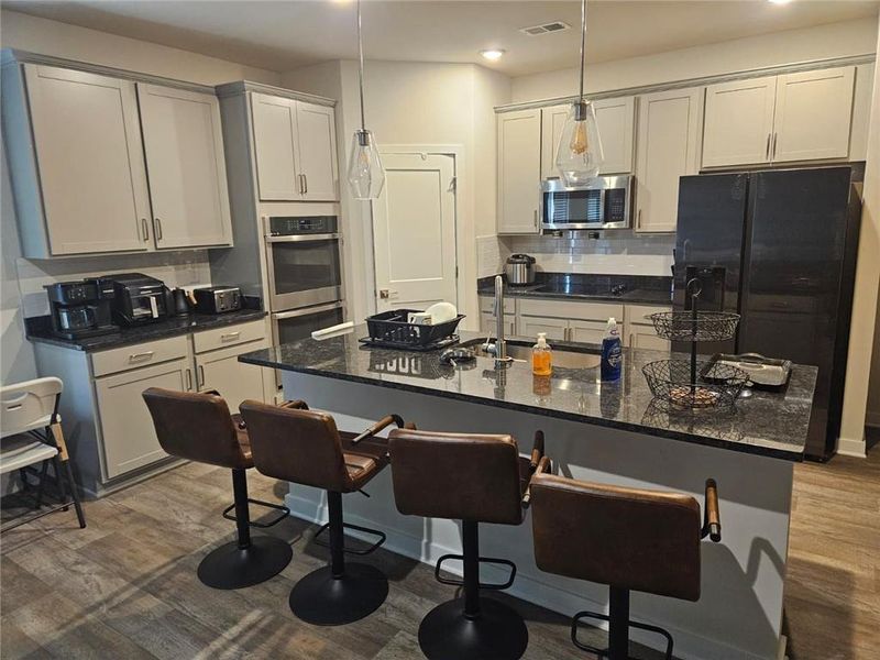Furnished interior view inside a new home in Fern Dale, Fairburn (Image 11).