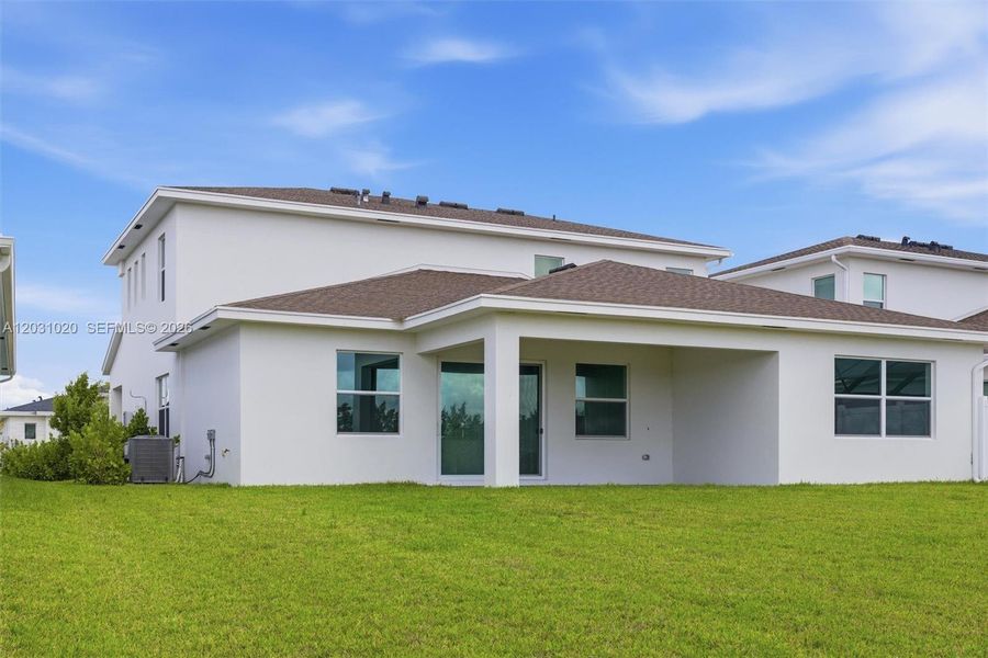 Exterior details and patio area of a home in Arden, Loxahatchee (Image 4).