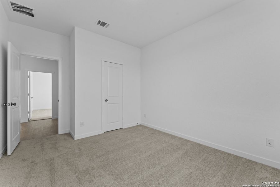 Spacious, unfurnished interior of a new home in Waterwheel: Coastline Collection, San Antonio (Image 15).