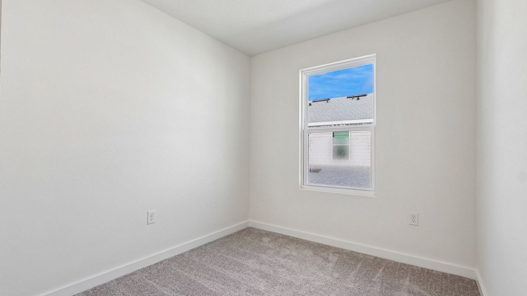 Furnished interior view inside a new home in Cyrene at Harmony, St. Cloud (Image 17).