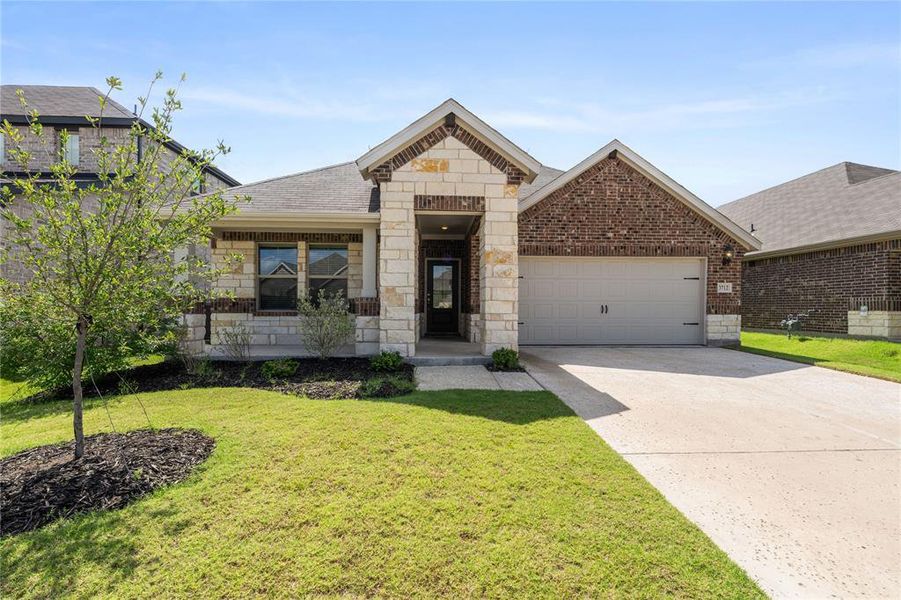 Front exterior of a new home in Lakehaven - Signature Series, Farmersville, TX, highlighting curb appeal (Image 21). Front exterior of a new home in Lakehaven - Signature Series, Farmersville, TX, highlighting curb appeal (Image 21).