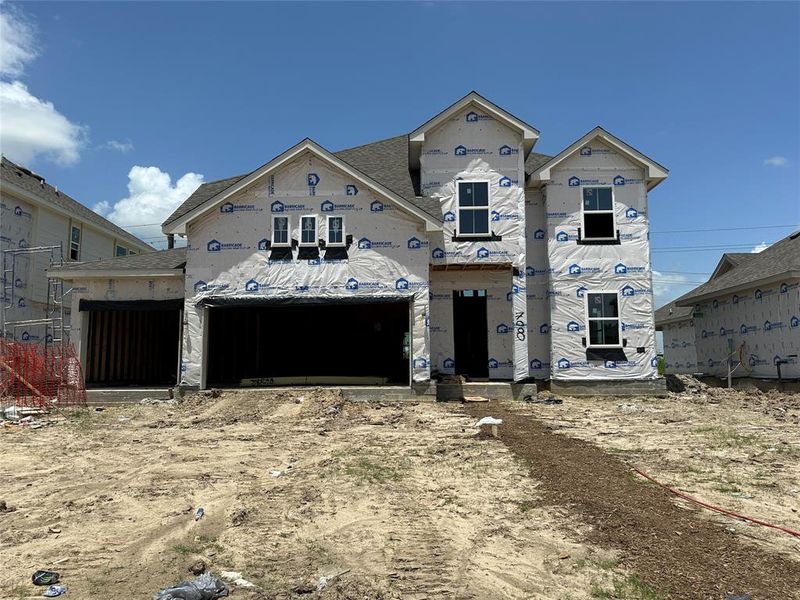 Two-story home with 4 bedrooms, 3.5 baths and 3 car attached garage