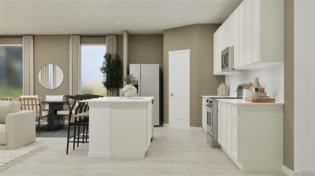 Kitchen featuring white cabinetry, stainless steel appliances, a kitchen island, a kitchen bar, and backsplash