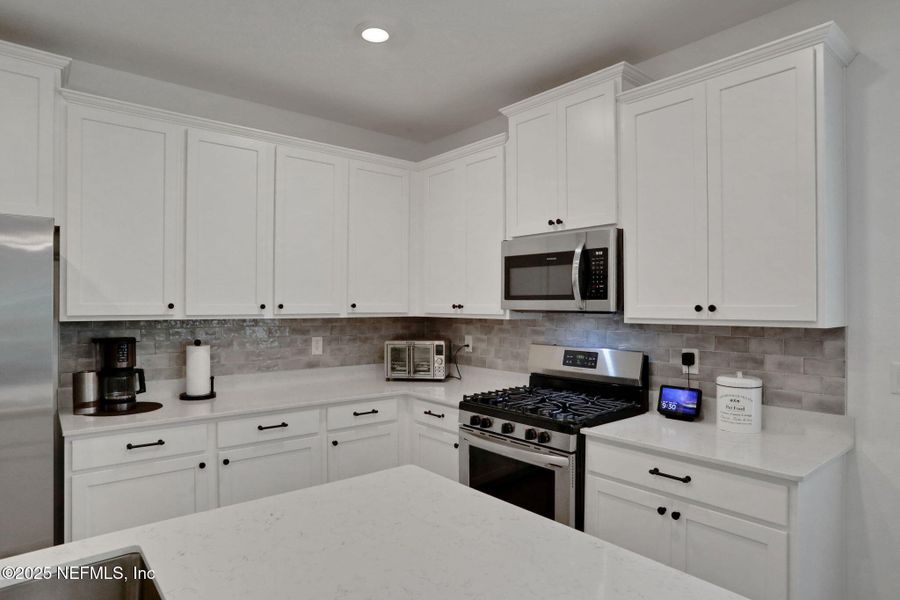 Furnished interior view inside a new home in Tributary: Lakeview at Tributary 50's, Yulee (Image 24).
