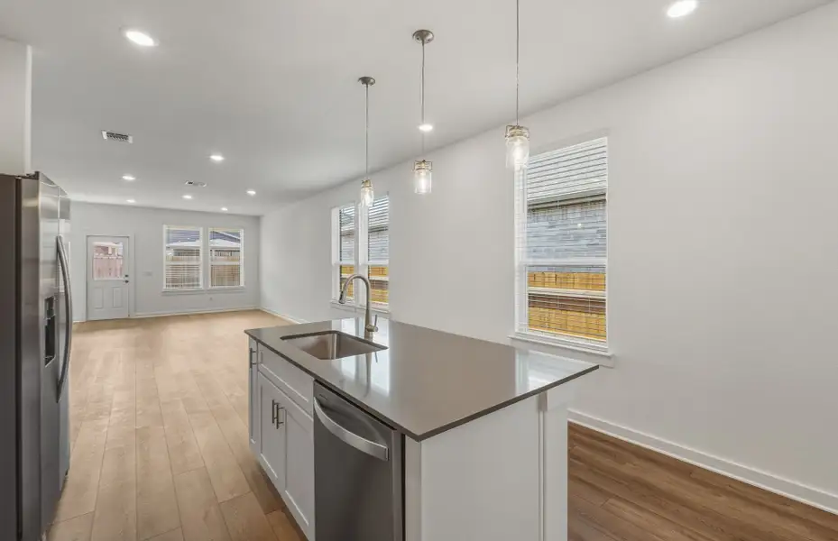 Furnished interior view inside a new home in Crosswinds, Kyle (Image 6).