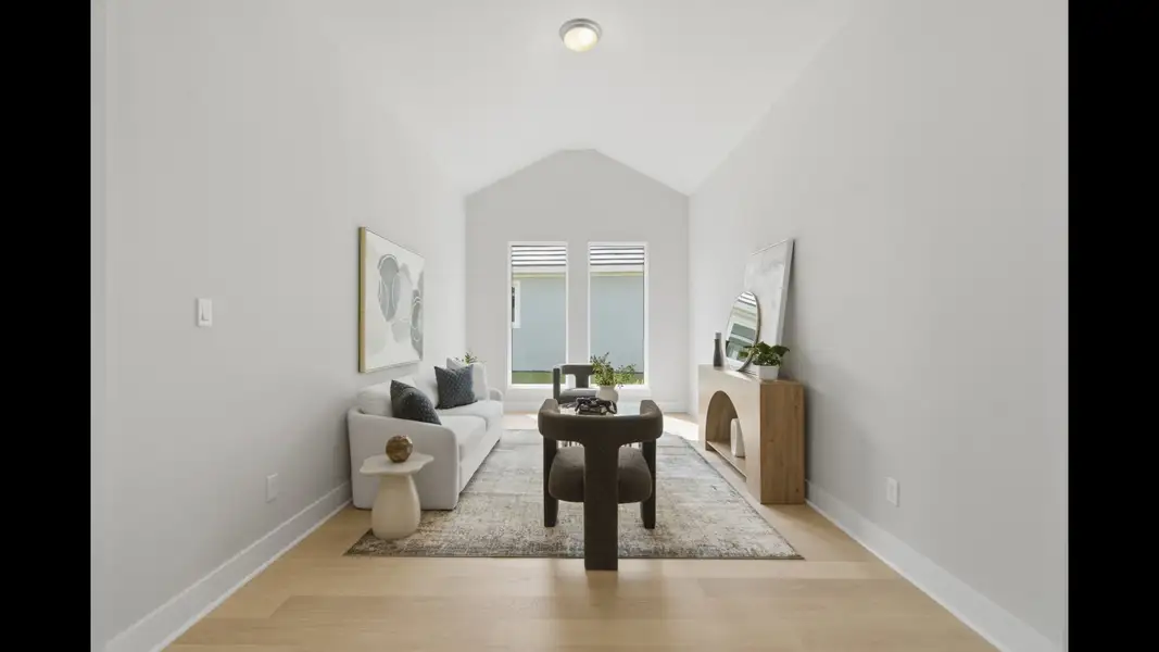 Representative furnished interior of a home built from the 2546F by Perry Homes in Sanctuary at Seaire, Parrish (Image 11).