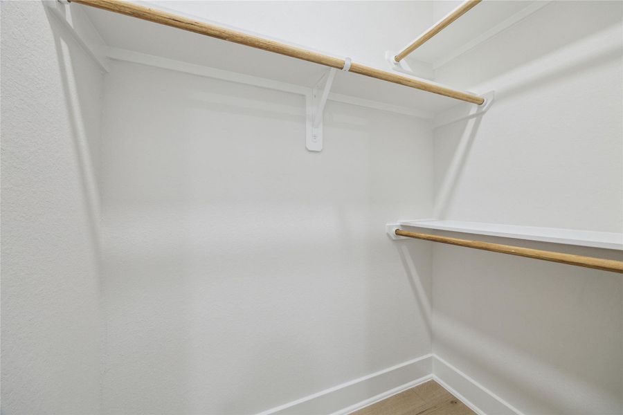 Spacious dual primary closets for ample storage and organization. Spacious dual primary closets for ample storage and organization.