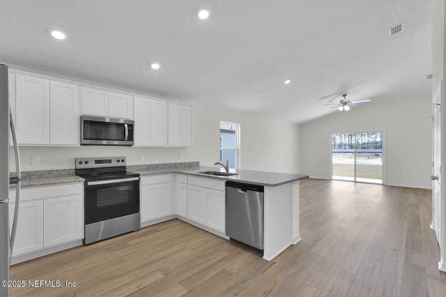 Furnished interior view inside a new home in , Jacksonville (Image 8). Furnished interior view inside a new home in , Jacksonville (Image 8).