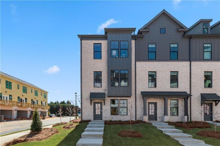 Front exterior of a new home in Silverock, McDonough, GA, highlighting curb appeal (Image 2). Front exterior of a new home in Silverock, McDonough, GA, highlighting curb appeal (Image 2).