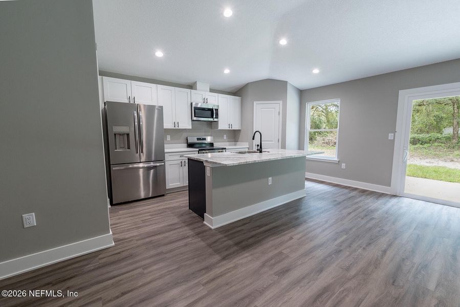 Furnished interior view inside a new home in , Florahome (Image 11).