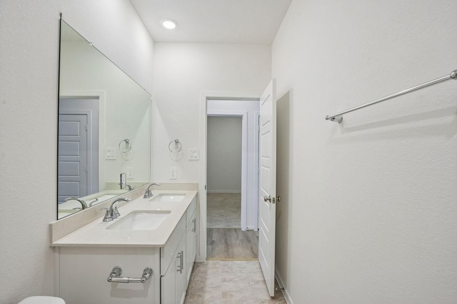 Furnished interior view inside a new home in Riviera Pines - Premier Series, Huffman (Image 7).