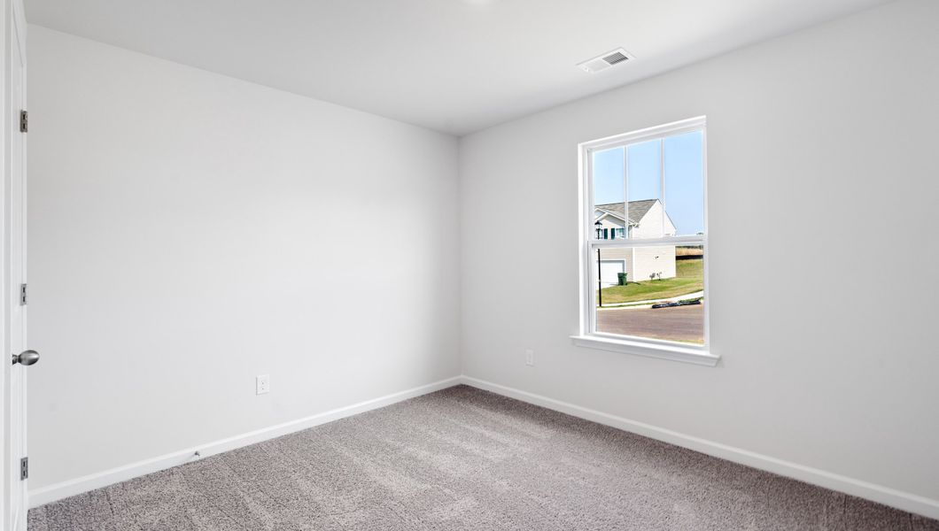 Spacious, unfurnished interior of a new home in Ravencrest, Roebuck (Image 11).