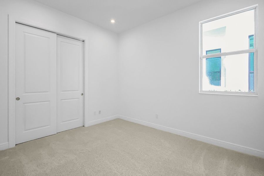 Spacious, unfurnished interior of a new home in Rivella, Port St. Lucie (Image 23).