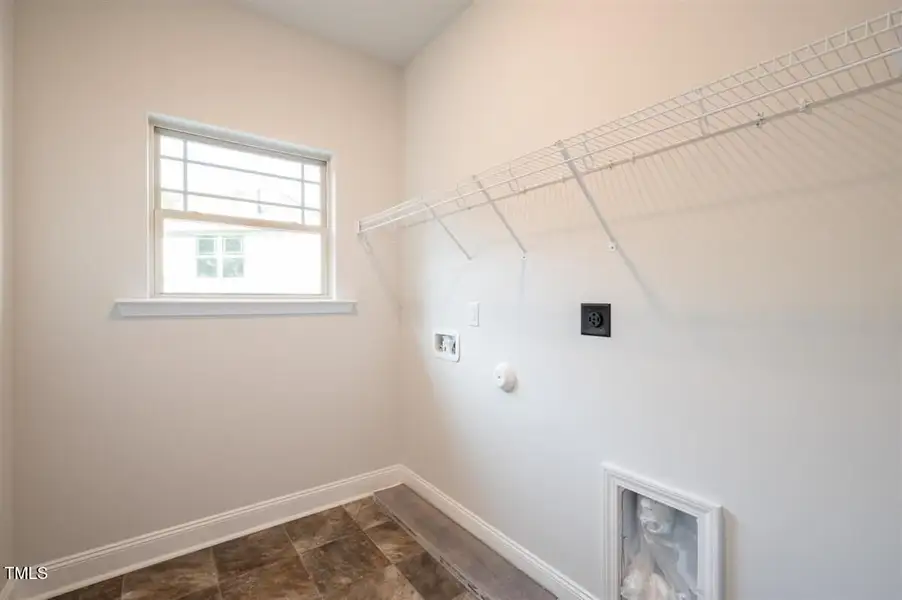 Representative unfurnished interior of a home built from the 2316 by Adams Homes in Hidden Pines, Cameron (Image 27).