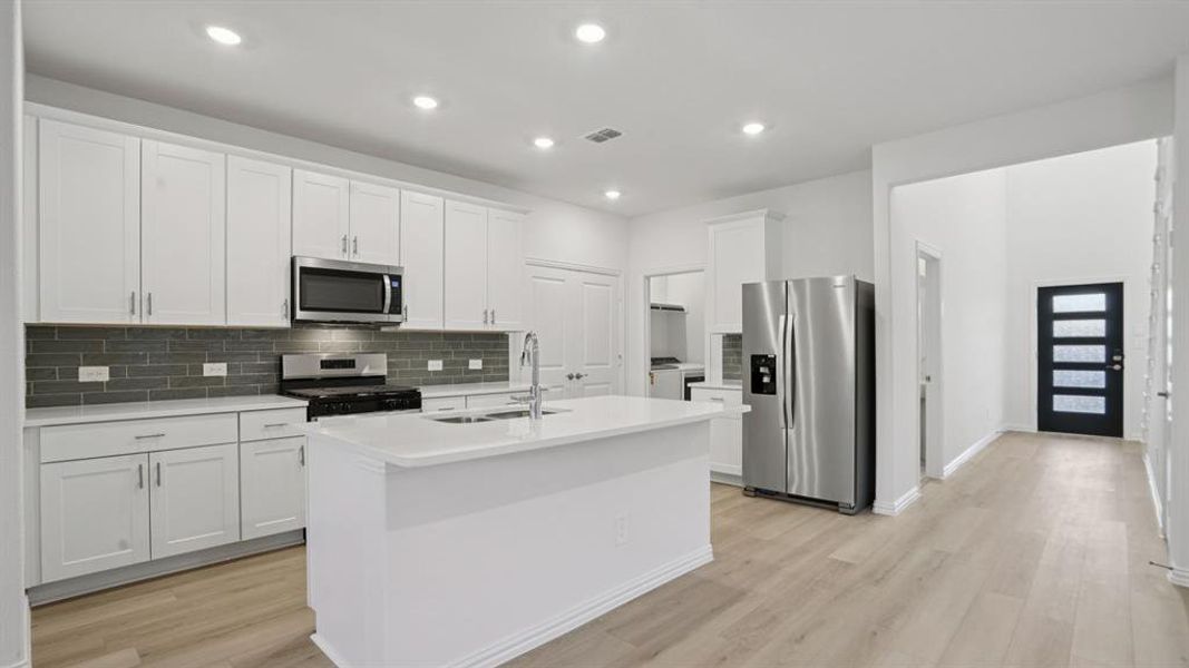 Furnished interior view inside a new home in Eastridge - Spring Series, McKinney (Image 7). Furnished interior view inside a new home in Eastridge - Spring Series, McKinney (Image 7).