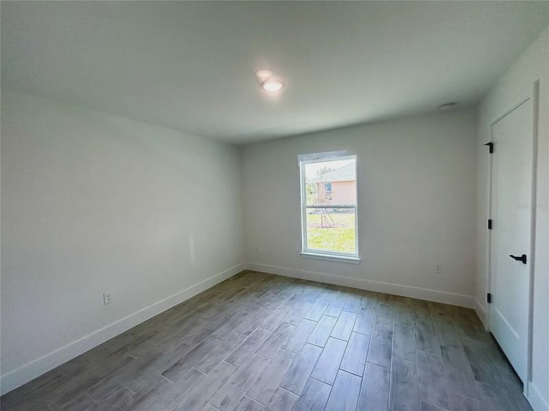 Spacious, unfurnished interior of a new home in Deep Creek, Punta Gorda (Image 19).