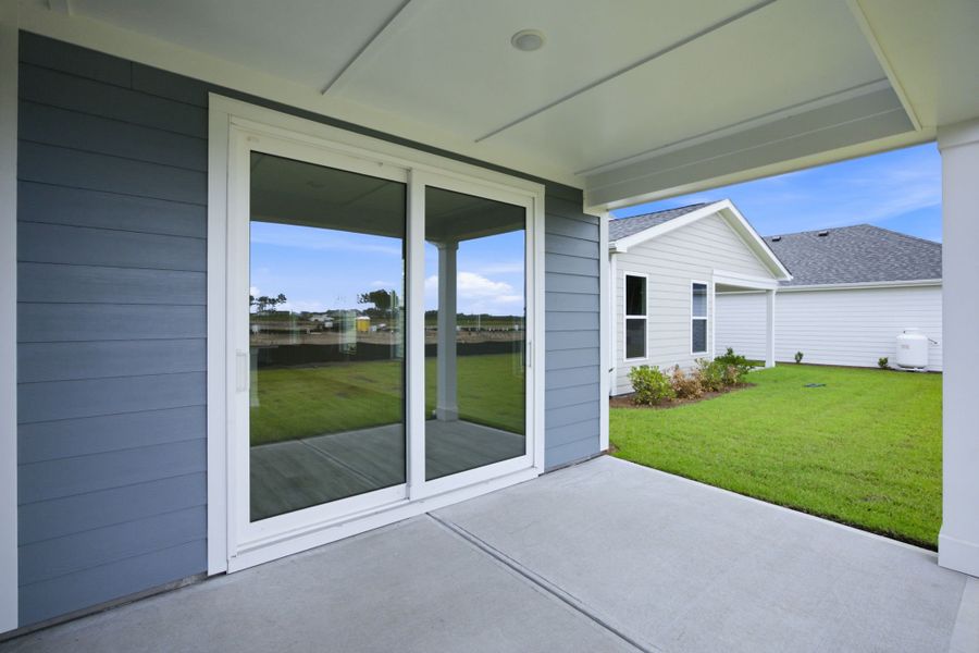 Exterior details and patio area of a home in Terrapin, Leland (Image 15). Exterior details and patio area of a home in Terrapin, Leland (Image 15).