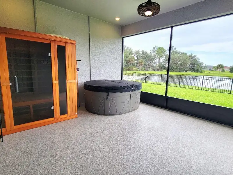 Exterior details and patio area of a home in , Parrish (Image 4).