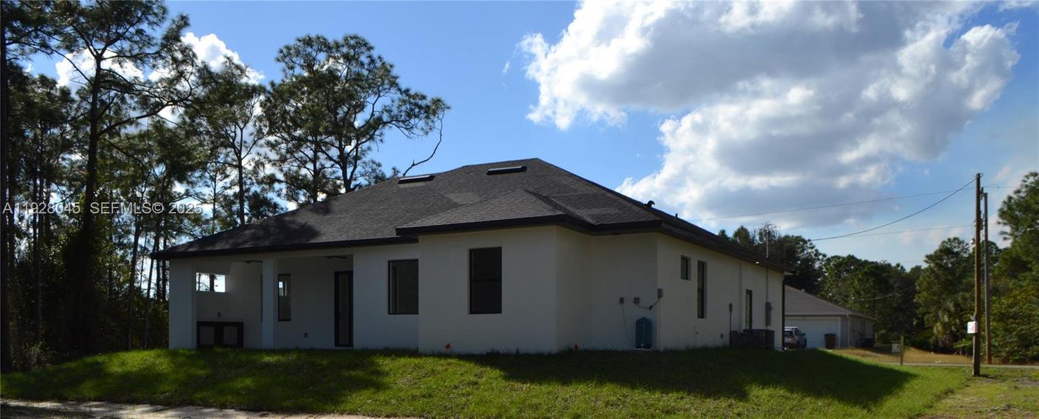 Exterior details and patio area of a home in , Lehigh Acres (Image 16).