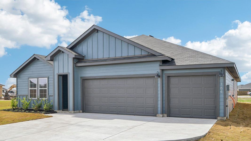 Front exterior of a new home in Railhead, Cedar Creek, TX, highlighting curb appeal (Image 2). Front exterior of a new home in Railhead, Cedar Creek, TX, highlighting curb appeal (Image 2).