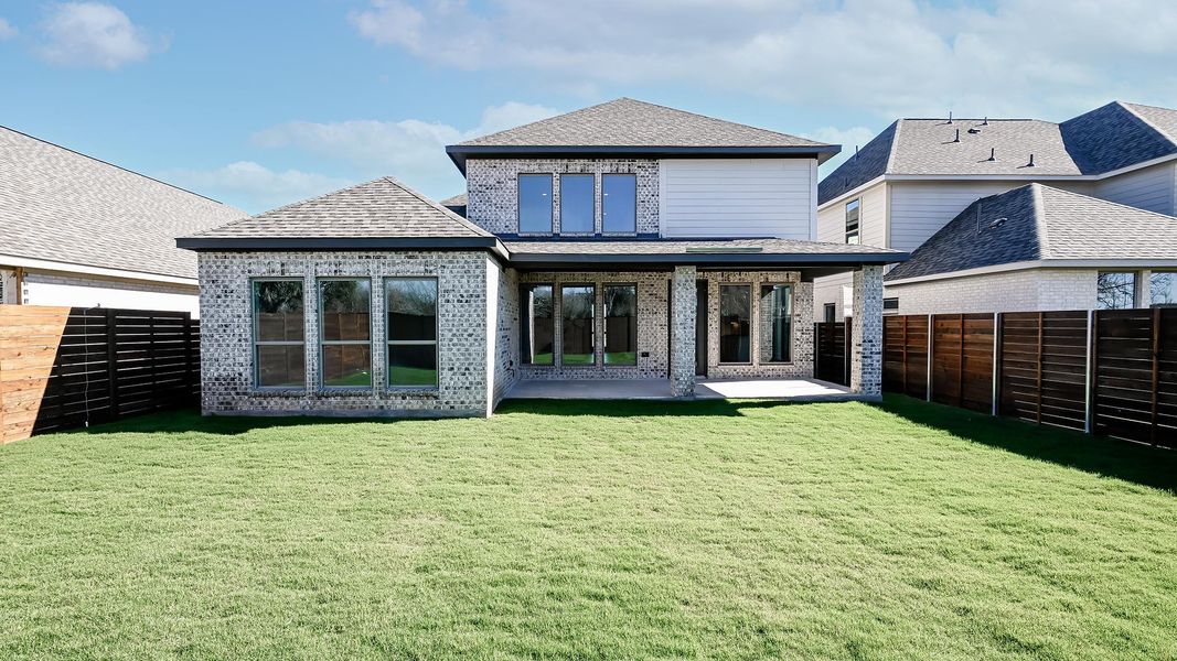 Exterior details and patio area of a home in Juniper Springs, Lockhart (Image 24).